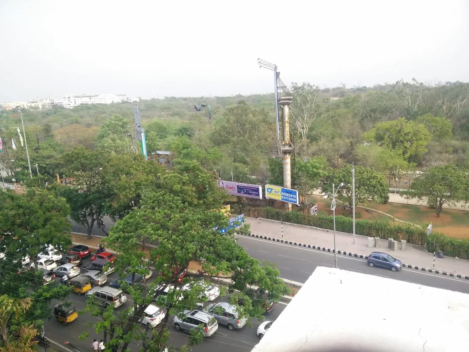 The tree-lined entrance to KBR Park, Hyderabad.