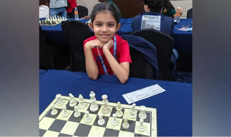 Young girl seated at a chessboard in a tournament hall