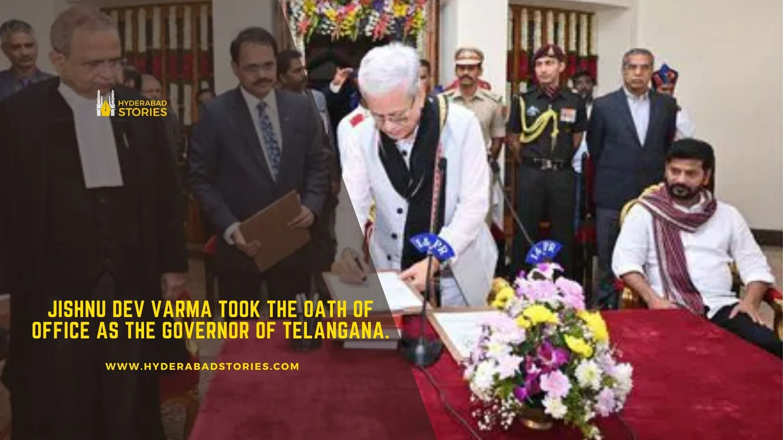 News graphic of an official signing a document at a formal indoor ceremony