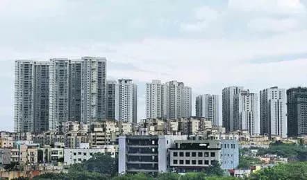 Cluster of high-rise residential towers above low-rise buildings
