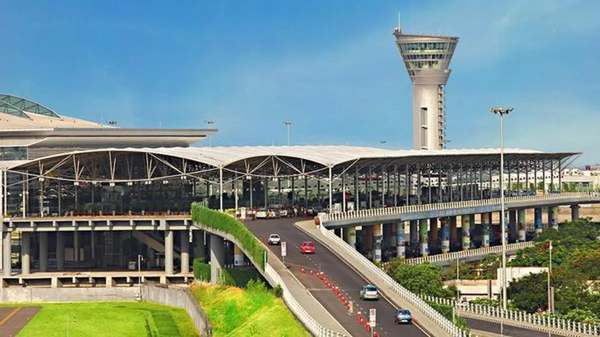 Airport terminal with an elevated roadway and control tower