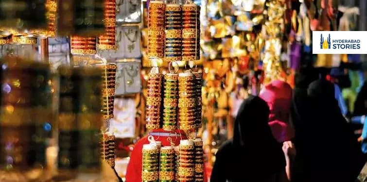 Market stall hung with rows of glass bangles