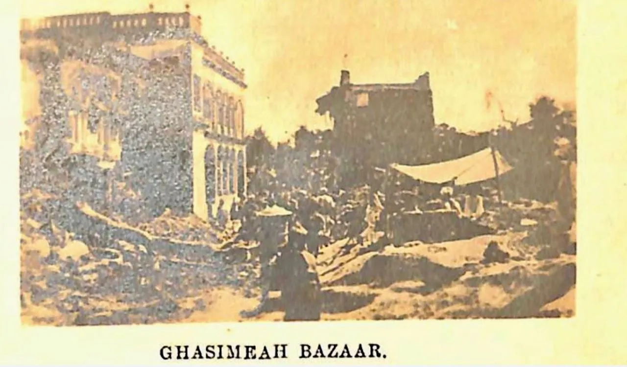 Archival photograph of rubble and damaged buildings