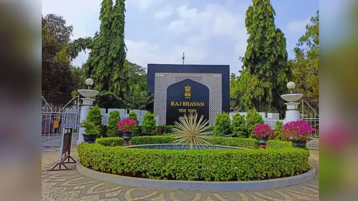 Landscaped garden and sign at the entrance to a government residence